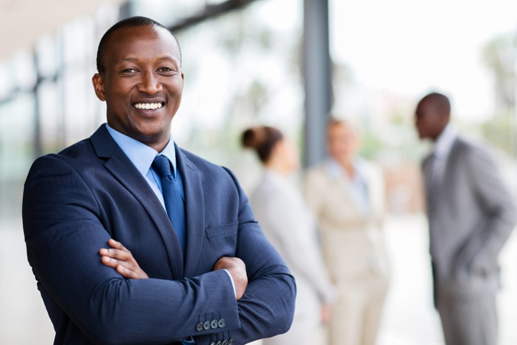 african office worker with arms crossed | The Port – Cincinnati